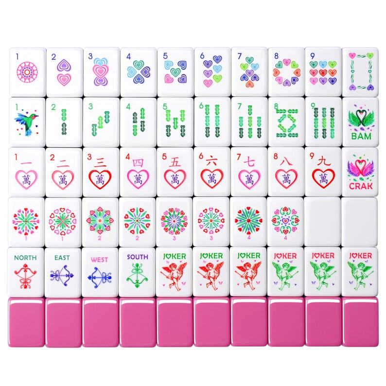 May include: A complete Mahjong set with white tiles featuring various symbols, numbers, and Chinese characters in red, green, and blue. The set includes pink tile holders. The tiles display hearts, flowers, and directional symbols.
