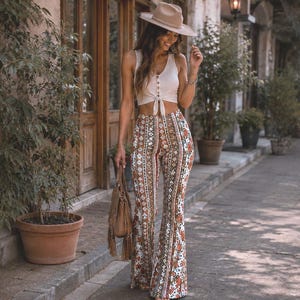 Boho flared broek voor dames, broek met bloemenprint en wijde pijpen, festivalbroek met hoge taille, retro hippie outfit