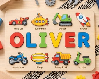May include: A wooden name puzzle featuring the name OLIVER in large, colourful letters. Surrounding the name are eight vehicle illustrations: a red race car, yellow submarine, green digger, rocket, blue motorcycle, yellow blimp, dump truck, and scooter.