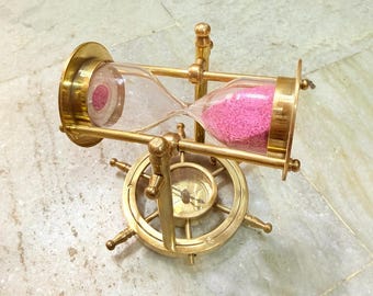 Vintage Brass Hourglass with Ship Wheel Compass Base | Nautical Sand Timer with Pink Sand | Maritime Office Decor & Steampunk Gift