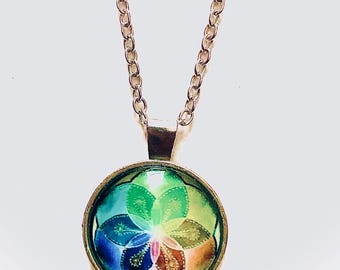 Flower Glass Pendant Charm with silver linked chain necklace.