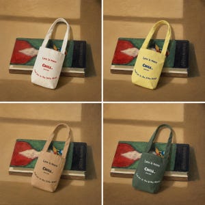Miniature canvas tote bag shown in hand with yellow, white, beige, and green color options in the backg