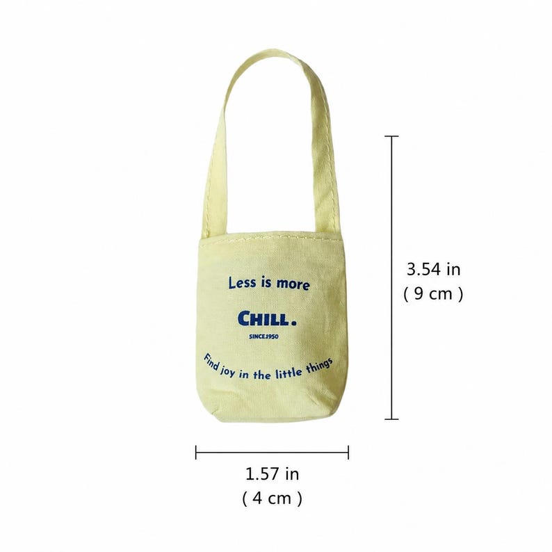 Yellow miniature canvas tote bag shown with size reference, measuring about 3.54 by 1.57 inches.