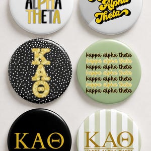 May include: Six circular pinback buttons featuring Kappa Alpha Theta designs. Designs include yellow and black text on white, yellow script on white, gold letters on black with white dots, repeating text on sage green, and gold text on black or striped backgrounds.