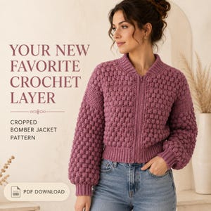 May include: A mauve-colored, long-sleeved, cropped crochet bomber jacket with a textured bobble stitch pattern, a ribbed collar, cuffs, and hem, and a front zipper closure. Text reads: YOUR NEW FAVORITE CROCHET LAYER, CROPPED BOMBER JACKET PATTERN, PDF DOWNLOAD.