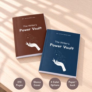 May include: Two paperback books titled The Writer's Power Vault by Rickiwrites, one in brown and one in navy blue. Each cover features a white graphic of a hand with swirling lines and stars. Text indicates 213 pages and glossy cover.