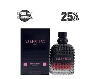 May include: A black Valentino Uomo Born in Roma Intense fragrance bottle and box. The bottle is black with a textured design and a pink base. The box is black with the Valentino logo and product information in pink.