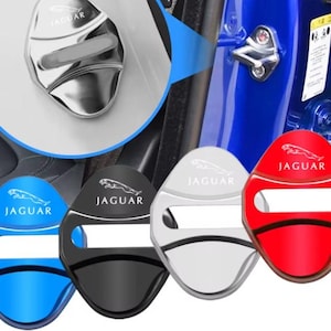 May include: A set of four car door lock covers in blue, black, silver, and red, each featuring the Jaguar logo and text. These protective covers are designed to fit over the metal door latch mechanism, as shown in the inset image on a blue car.