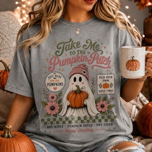 May include: A heather gray t-shirt featuring a graphic of a ghost wearing a pink beanie and holding an orange pumpkin. The text reads Take Me To The Pumpkin Patch, Just Here For The Pumpkins, Pick Your Own Good Times, Hay Rides, and Happy Haunting.