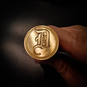Custom wax stamp letters Engraved Initials Couple holdings