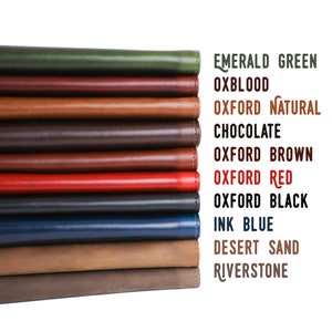 May include: A stack of ten leather samples in various colors, including emerald green, oxblood, natural, chocolate, brown, red, black, ink blue, desert sand, and riverstone.
