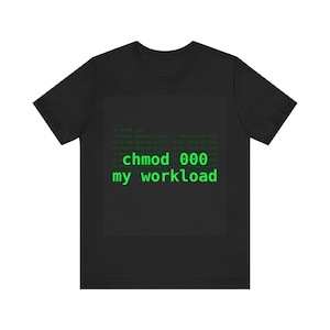May include: Black t-shirt with the text "chmod 000 my workload" in green, a humorous reference to computer programming. The shirt has a crew neck and short sleeves.