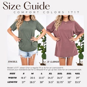 May include: A size guide for Comfort Colors 1717 t-shirts featuring two examples of the garment in olive green and mauve. The chart lists widths and lengths in inches for sizes small through 4XL, noting a model height of 5 feet 7 inches.