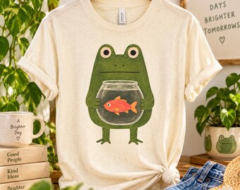 Frog Holding Fish Bowl T-Shirt | Cute Amphibian Graphic Tee