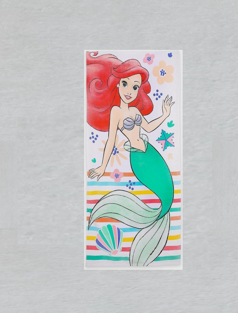 May include: A rectangular illustration of a mermaid with red hair, a teal tail, and a seashell top. The background features flowers, stars, and a striped pattern in various colors. A seashell is also included in the design.