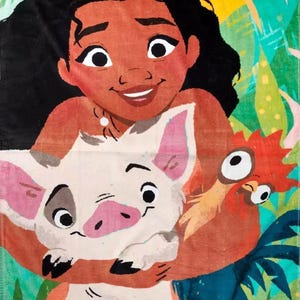 May include: A colorful beach towel featuring a cartoon illustration of a smiling woman holding a pig and a rooster. The background includes a yellow sun, green foliage, and a pink sky.