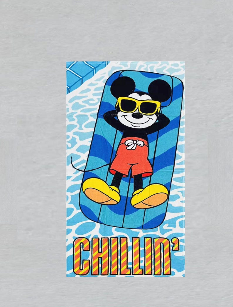 May include: A beach towel featuring Mickey Mouse relaxing on a blue and white striped pool float, wearing yellow sunglasses and red shorts. The towel has the word "CHILLIN'" in orange and yellow block letters.