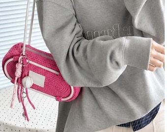 borsetta rosa all'uncinetto