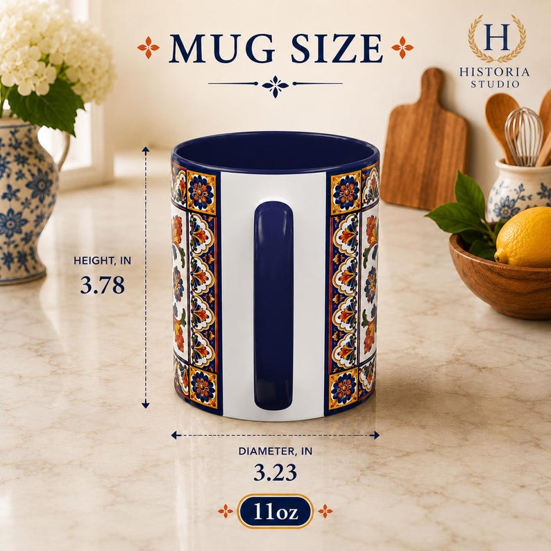 May include: A ceramic mug with a dark blue handle and interior, featuring a white vertical panel and colorful floral tile patterns. Text indicates a height of 3.78 inches, a diameter of 3.23 inches, and an 11 oz capacity for this mug size.