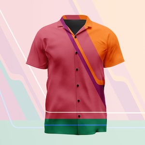 May include: A short-sleeve button-down shirt featuring a vibrant color-blocked design. The garment displays a diagonal pattern of pink, orange, and purple stripes, with a solid green band at the bottom separated by thin white and blue horizontal lines.