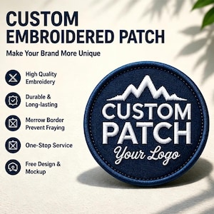 May include: A circular navy blue embroidered patch with a white mountain graphic and the text CUSTOM PATCH Your Logo. The patch features a merrow border. Text on the left lists features including High Quality Embroidery and Durable & Long-lasting.