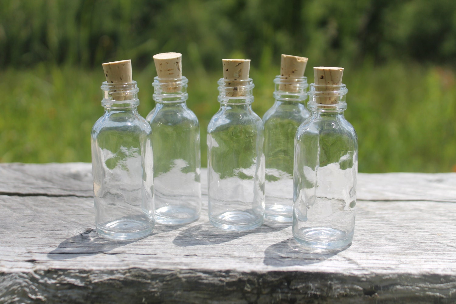 EOI Small clear glass bottle with cork - Bound to be Different