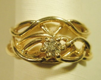 14 karat gold diamond engagement ring and band