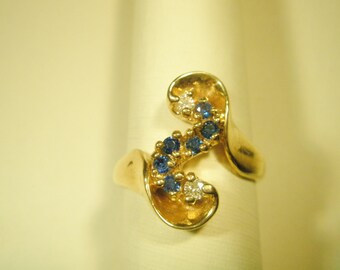 14 Karat Gold Sapphire and Diamond ring