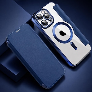 May include: A dark blue phone case with a folio cover and a clear back panel featuring a circular magnetic charging ring. The case includes a cutout for a triple-lens camera system and a metallic blue frame that surrounds the edges and camera module.