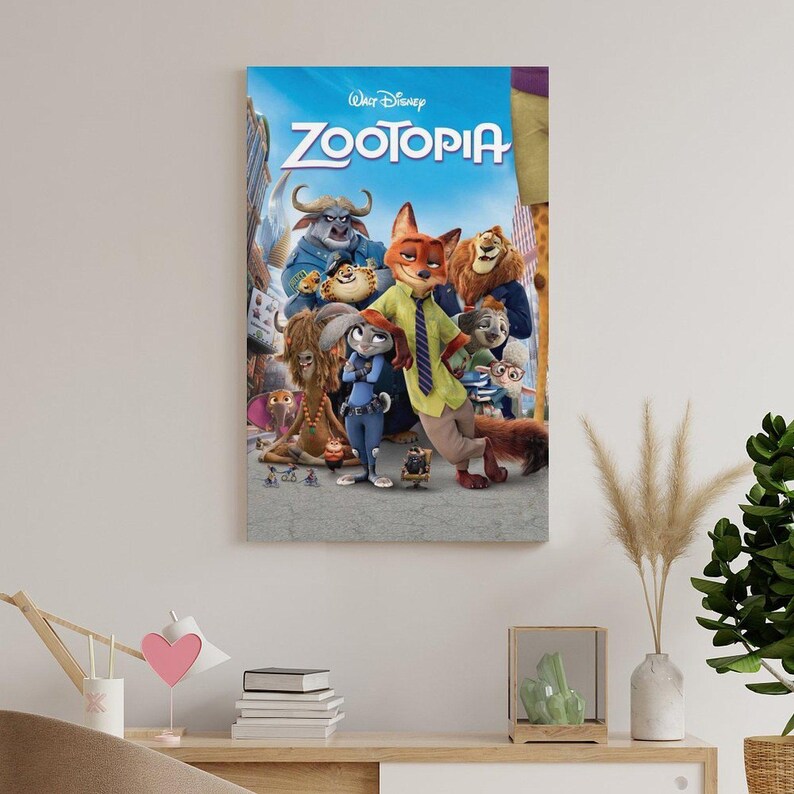 May include: A framed poster featuring the animated film "Zootopia." The poster showcases a vibrant ensemble of anthropomorphic animal characters, including a fox in a green tie, a rabbit in a police uniform, and a lion. The title "Zootopia" is prominently displayed in blue and white.