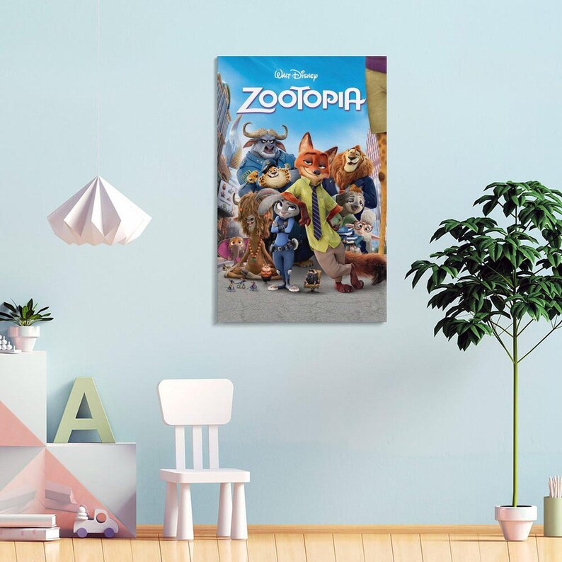 May include: A framed poster featuring the animated film "Zootopia." The poster showcases a group of anthropomorphic animal characters against a cityscape backdrop. The title "Zootopia" is prominently displayed in large, stylized letters at the top.