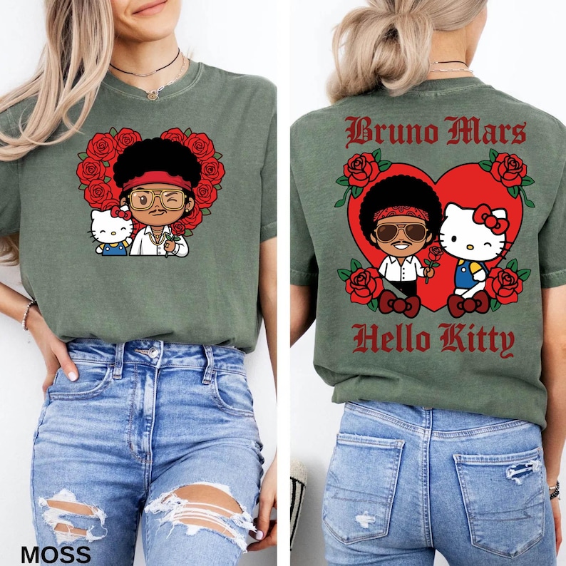 May include: Moss green t-shirt featuring a cartoon illustration of a character with sunglasses and Hello Kitty, surrounded by red roses. The back of the shirt has the text "Bruno Mars Hello Kitty" in a heart shape.