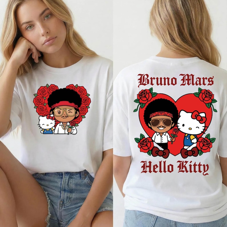 May include: White t-shirt featuring a cartoon illustration of Bruno Mars and Hello Kitty inside a heart-shaped design with roses. The front of the shirt shows the characters, while the back displays the text "Bruno Mars Hello Kitty".