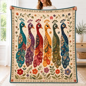 May include: A rectangular quilt featuring a cream-colored background with a border of vines and flowers. The center displays six stylized peacocks in teal, purple, red, yellow, green, and blue, each decorated with floral patterns and long tail feathers.