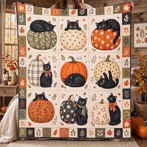 May include: A quilt featuring a grid of nine squares, each displaying a black cat and a pumpkin. The cats are shown in various poses, some wearing bows or scarves. The border is decorated with a repeating pattern of autumn leaves and berries.
