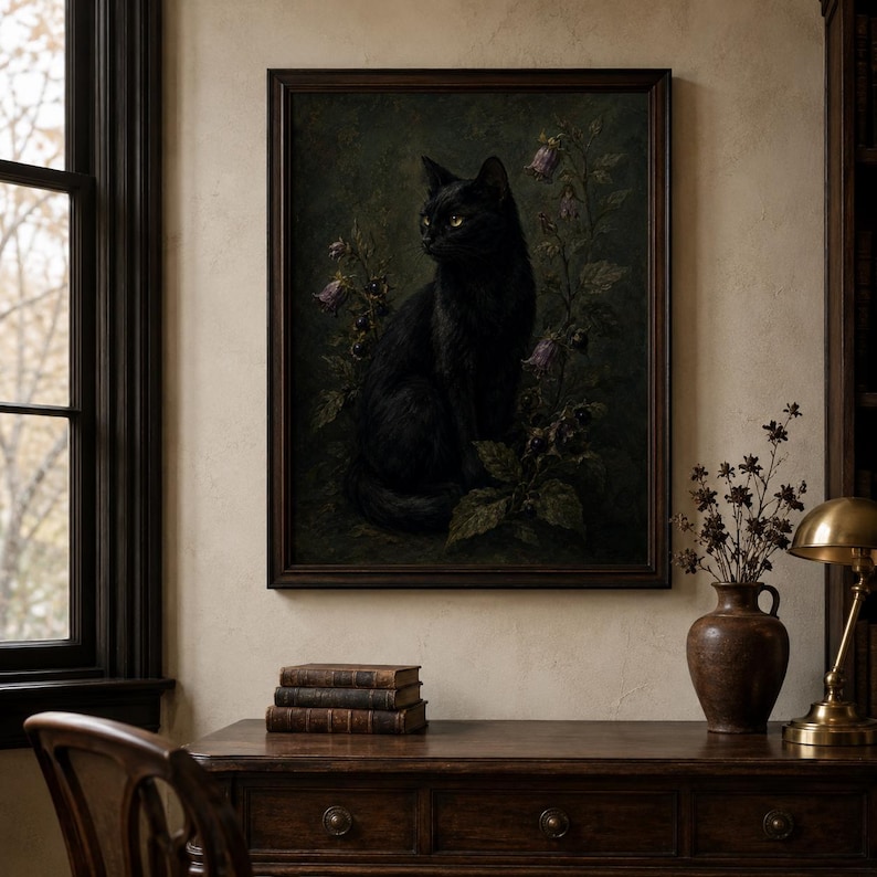 Black cat wall art print featuring a sleek black cat surrounded by belladonna flowers dark berries and moody foliage on a vintage gothic poison garden background.