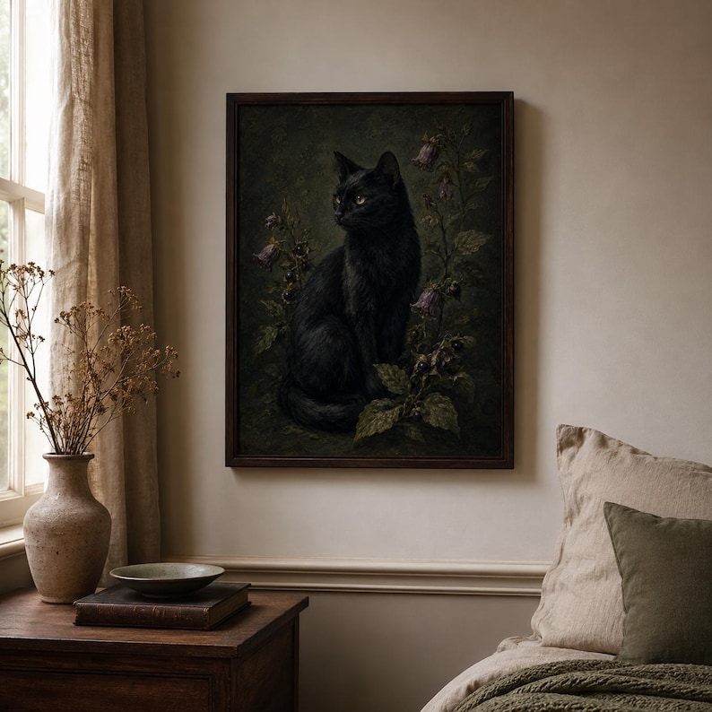 Black cat wall art print featuring a sleek black cat surrounded by belladonna flowers dark berries and moody foliage on a vintage gothic poison garden background.