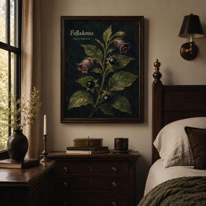 Belladonna wall art print featuring deadly nightshade with purple bell-shaped flowers glossy black berries green leaves and vintage text on a dark gothic botanical field guide background.