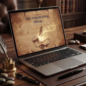 May include: A laptop displaying a digital cover titled The Manifesting Ritual 7-Day Journal with an illustration of a hand holding a quill pen writing in a book, surrounded by glowing light effects on a parchment-style background.
