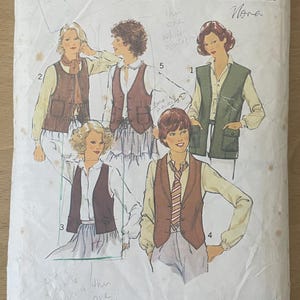 May include: Vintage sewing pattern titled "Style" with illustrations of vests. The pattern is size 16, bust 97cm. The cover is off-white with brown text and illustrations. The price is listed as $1.80 Australia and $1.40 New Zealand.