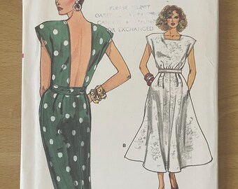 Vogue 9605 vintage 80s dress with semi-fitted bodice, waistband, pleats, pockets, zip, hemline slit and cap sleeves sewing pattern