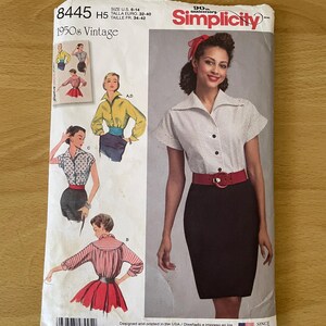 May include: A vintage Simplicity sewing pattern for a 1950s style. The pattern shows illustrations of a woman in a polka dot blouse, pencil skirt, and red belt. The pattern size is U.S. 6-14, equivalent to a Euro size 32-40.