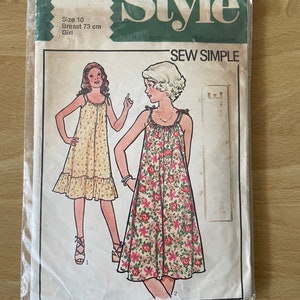 Style 2303 vintage 70s flared summer dress with drawstring tie shoulders and optional ruffle sewing pattern