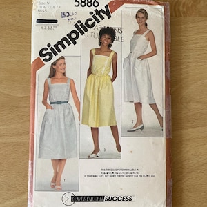 Simplicity 5886 vintage 80s sundress with fitted bodice, shoulder straps, elastic waist, ruffles, pockets and belt sewing pattern
