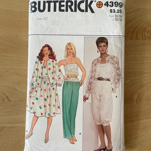 May include: A vintage sewing pattern for women's clothing. The pattern is for a skirt, pants, and a blouse. The pattern is from Butterick and the pattern number is 4399. The pattern is for size 10.