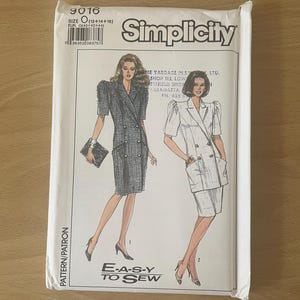 May include: Simplicity sewing pattern packet, style 9016, featuring illustrations of two women's suit designs. The packet includes size information and the text "E-A-S-Y TO SEW."
