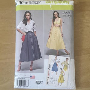 May include: A vintage Simplicity sewing pattern for a 1950s design. The package shows images of a skirt and top outfit. The pattern includes the text "1166" and "H5", with size details in US, Euro, and French measurements.