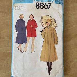May include: A vintage Simplicity sewing pattern packet, featuring illustrations of women's coats. The packet is light blue with the number 8867 in large black font. The bust size is 104 cm, and the size is 18 1/2.