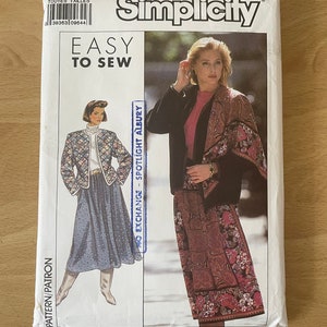 May include: Simplicity sewing pattern package with a photo of two women wearing skirts and jackets. The pattern number is 9416 and the text "Easy to Sew" is printed on the front. The package is labeled "No Exchange - Spotlight Albury".
