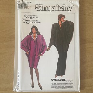 May include: A Simplicity sewing pattern packet with illustrations of two women's garments. The packet is white with the brand name and the words "E-A-S-Y TO SEW" and "F-A-C-I-L-E A COUDRE" printed on it. The packet also includes the word "OVERLOCK/SERGER".